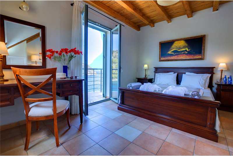  Villa Akrogiali master bedroom with doors to balcony