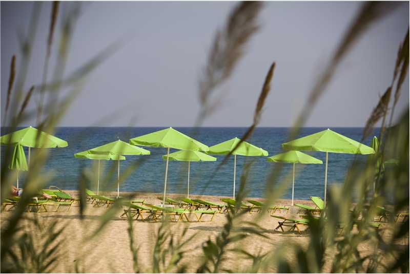 Sunloungers and parasols on Skala beach