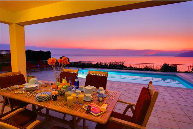 Fiscardo House dine alfresco watching the sunset over the Ionian Sea