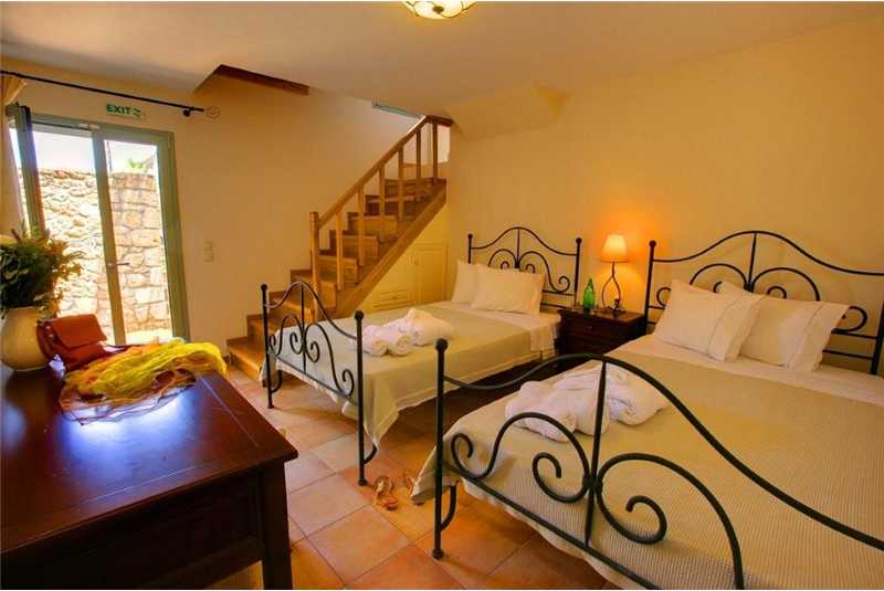 Villa Thea twin bedroom with pool access